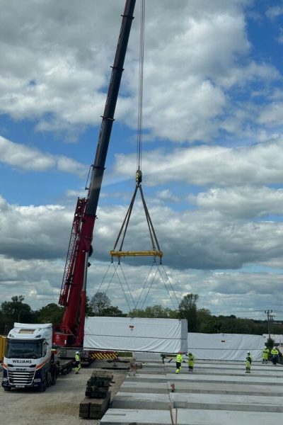 CMOD Lifting Tesla Batteries Min Scaled 1