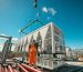 Heat pump lifted into position on roof top